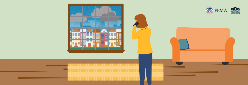 person talking on a cell phone looking outside their window