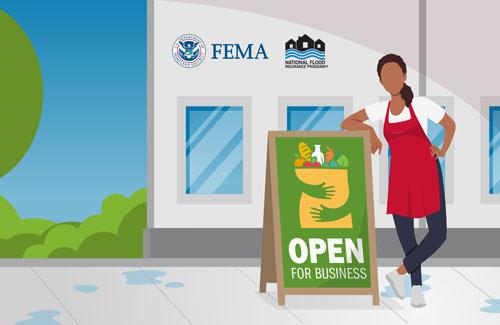 Employee leaning on a sign that reads "Open for Business"