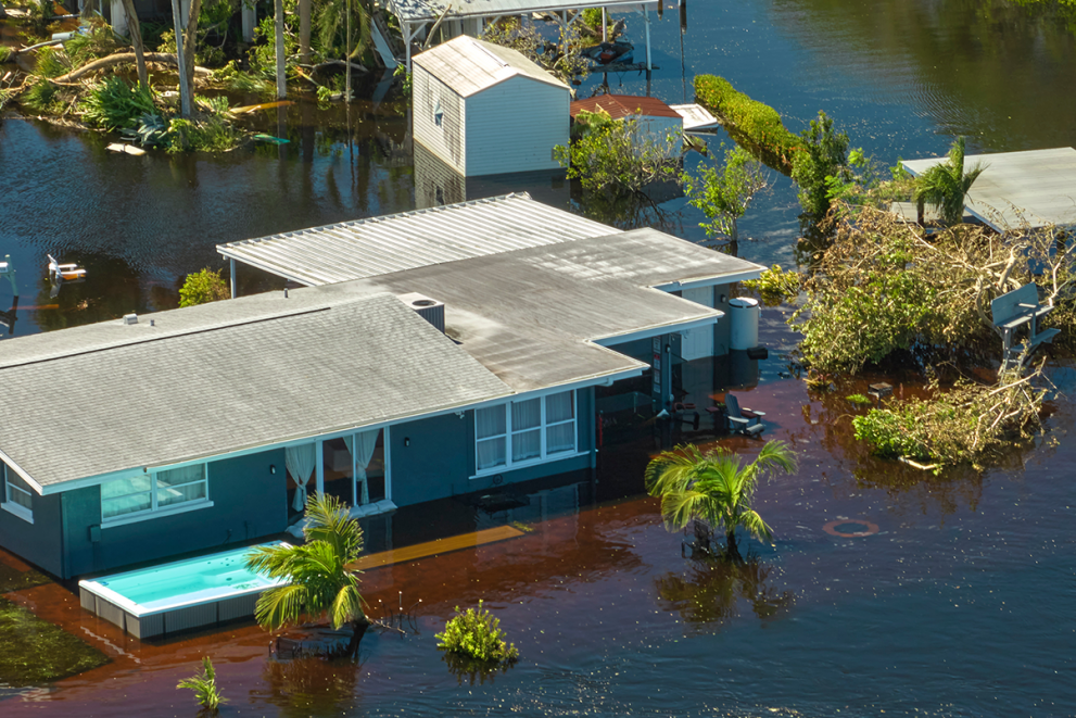 Aerial view of a flooded rural house