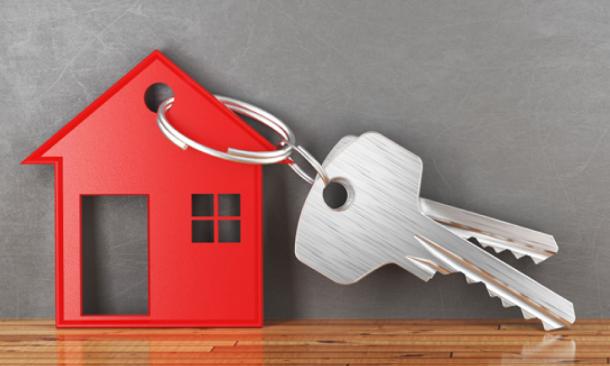 Keychain with red house ornament
