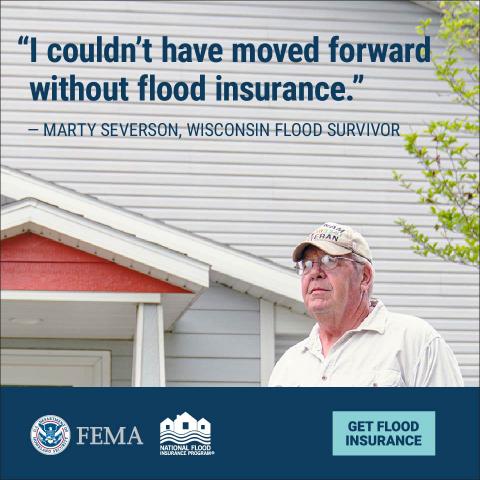 An image of a man standing outside a house