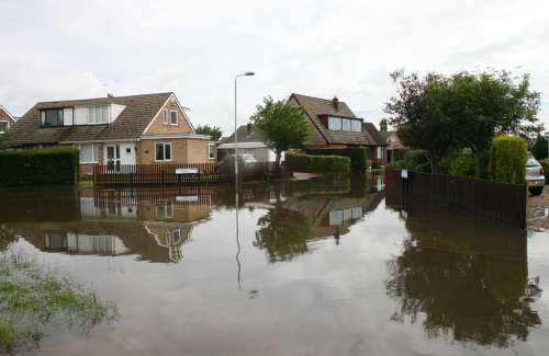 Flooded residential street after a storm