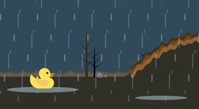 A picture of a rubber duck sitting in a puddle as it rains.