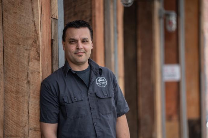 An image of a man standing in a building.