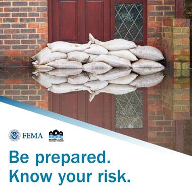 Pile of flower bags sitting in flood water. Text: Be prepared. Know your risk.