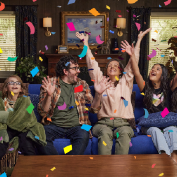Happy family celebrating that they have flood insurance