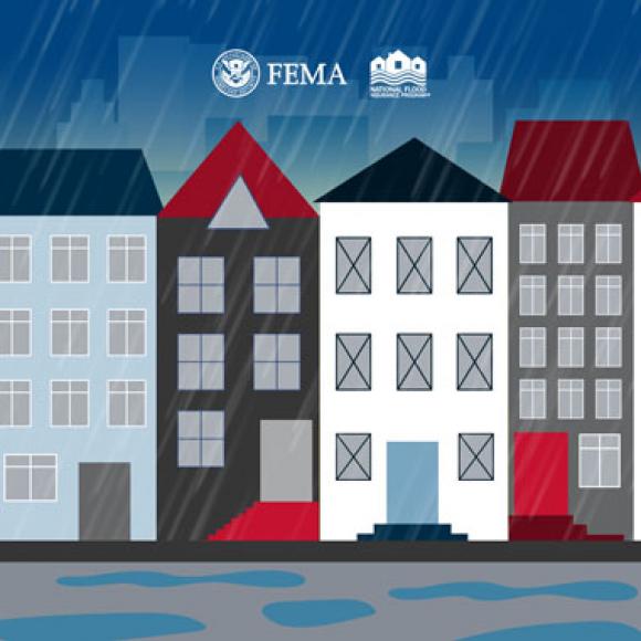 Rain creating big puddles in the street in front of rowhomes