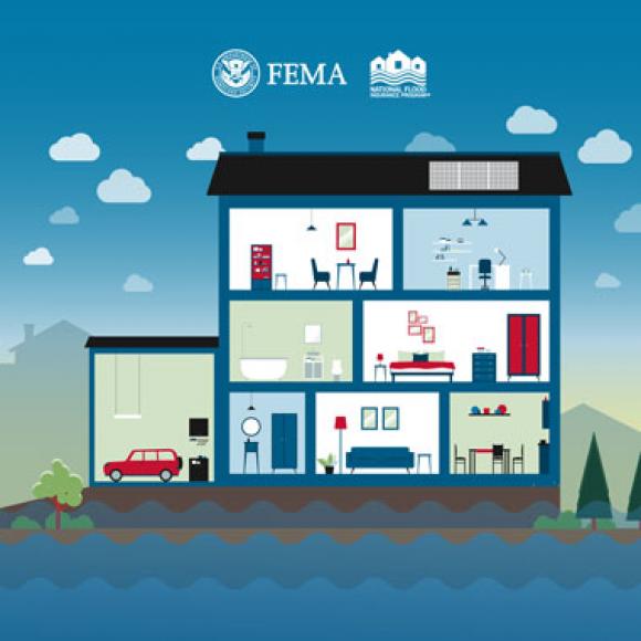 3-story home on foundation raised above flood waters.