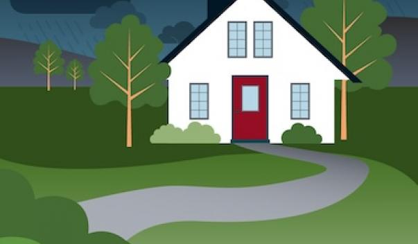 Rainstorm over country house surrounded by forest
