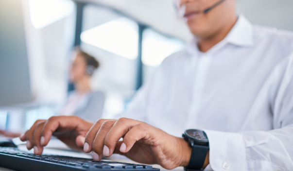 Man typing on keyboard